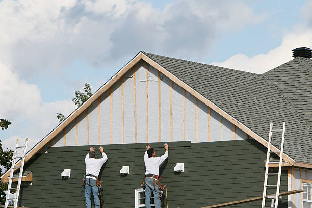 Professional Emergency Siding Repair technician working in Woolford, MD